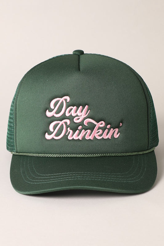 Picture a trucker hat, quintessential in style and comfort. The hat is intricately designed with a mesh fabric at the back for breathability. It features a wide brim to shield the eyes from the sun. T